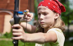young=girl-shooting-bow-and-arrow