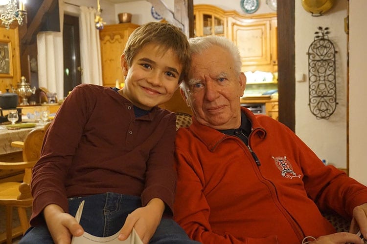 grandpa-and-grandson-smiling-at-camera